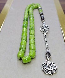 NAKKAŞLI PÜSKÜLLÜ SIKMA KEHRİBAR