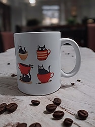 Kedi temalı porselen kupa fincan.Kanvas postacı çantası hediyeli.