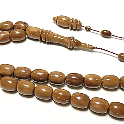 ‎ÜST DÜZEY KUKA TESBİH KAPSÜL 9,5x12 MM.