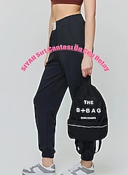 Kadın Siyah Omuz ÇantasKumaş: PARAŞÜT/DOKUMAKumaş İçerik: %100 Polyester  Ürün Uzunluk:16cm. Ürün En:0cm.  Ürün renginde