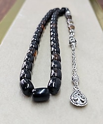 nakkaşlı püsküllü sıkma kehribar