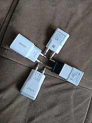 4 adet çeşitli marka 5 w şarj adaptörü arkadaşlar ürün Ler ihtiyaç fazlası ürün lerdir. hepside sorunsuz calışır durumda